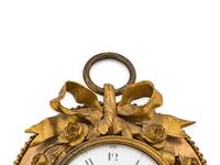 A Louis XVI Gilt Bronze Wall Clock