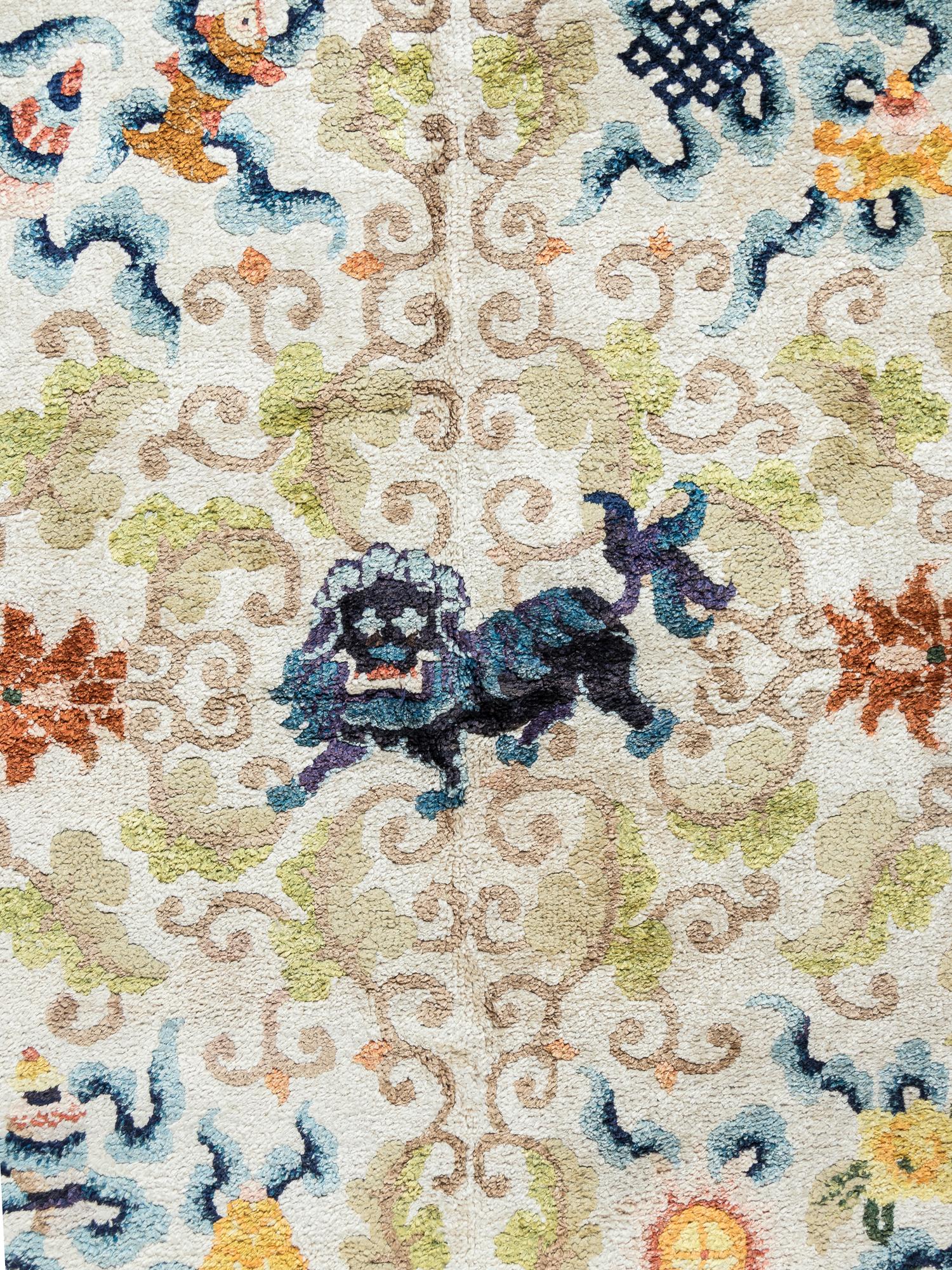 A Chinese Silk Rug with Lions