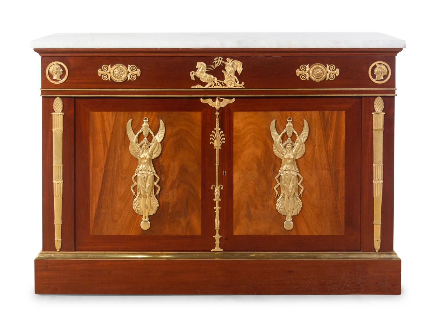 An Empire Style Gilt Bronze Mounted Mahogany Cabinet