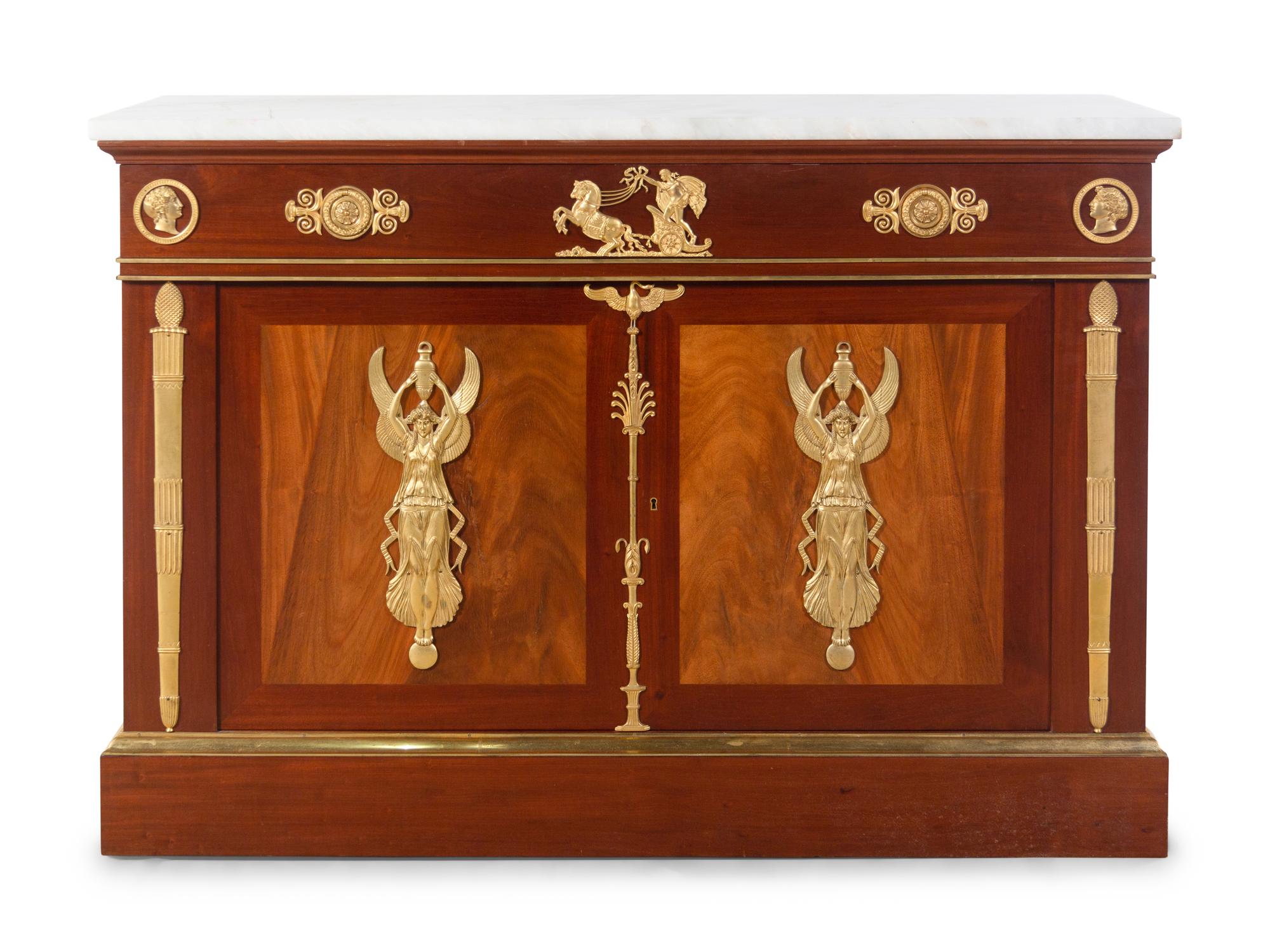An Empire Style Gilt Bronze Mounted Mahogany Cabinet