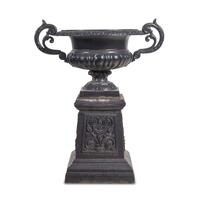 A Painted Cast Iron Garden Urn and Pedestal