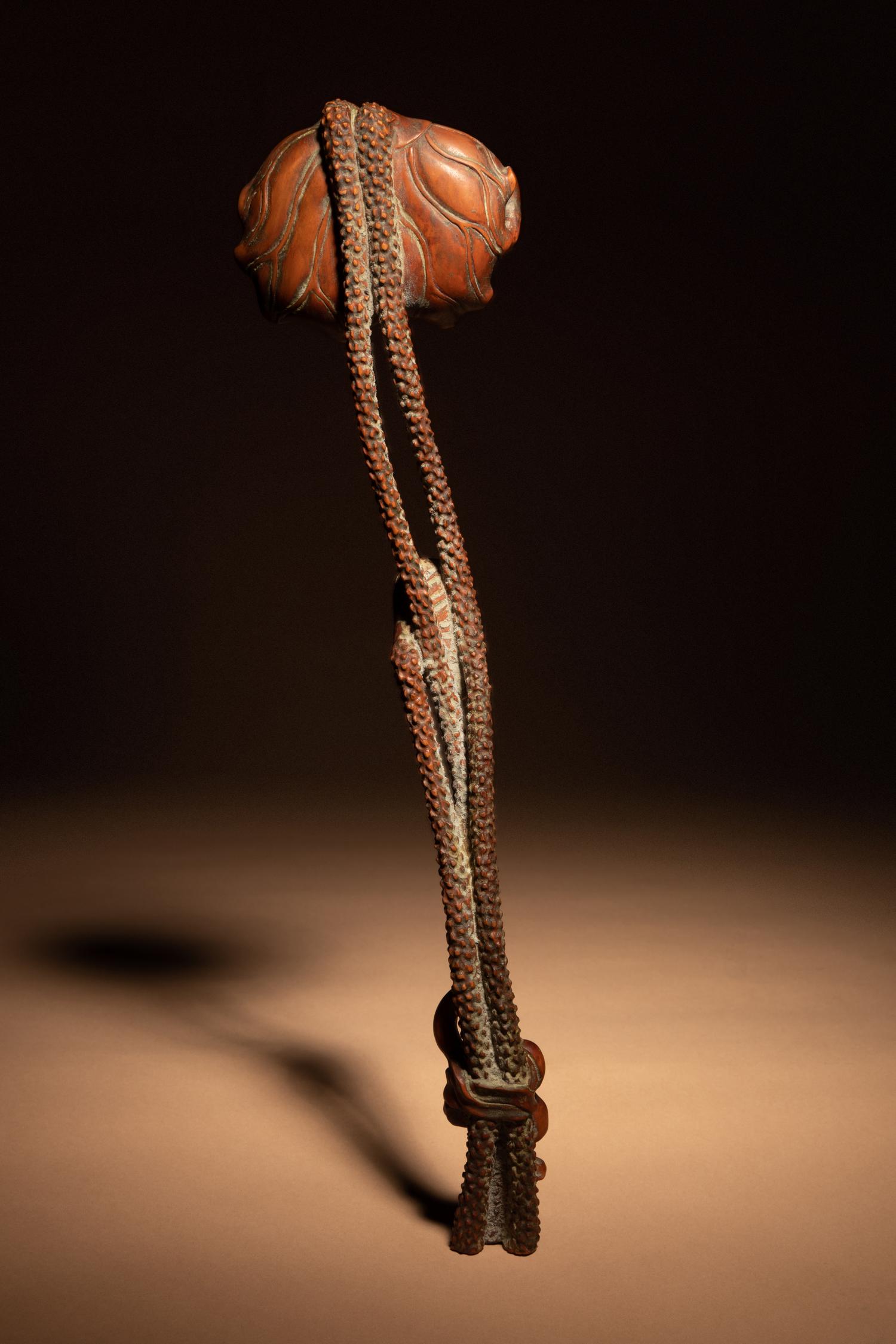 A Chinese Carved Boxwood 'Lotus and Frog' Ruyi Scepter