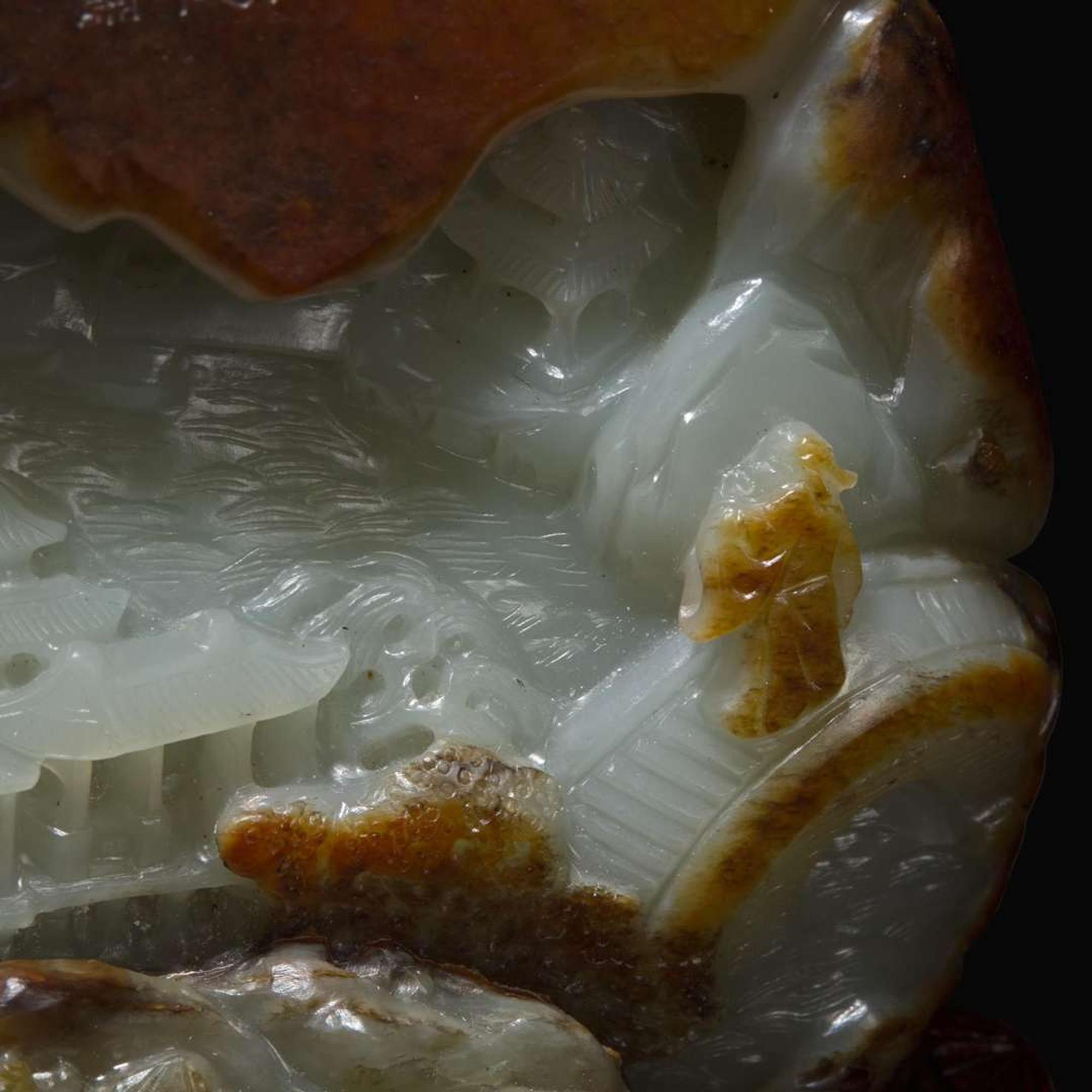 A Chinese russet and pale celadon jade "Mountain" boulder 玉雕山子及底座 Jade late Qing or earlier ????????