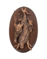 A Pair of Copper or Brass Game Mounts Height overall 31 x width 16 inches.
