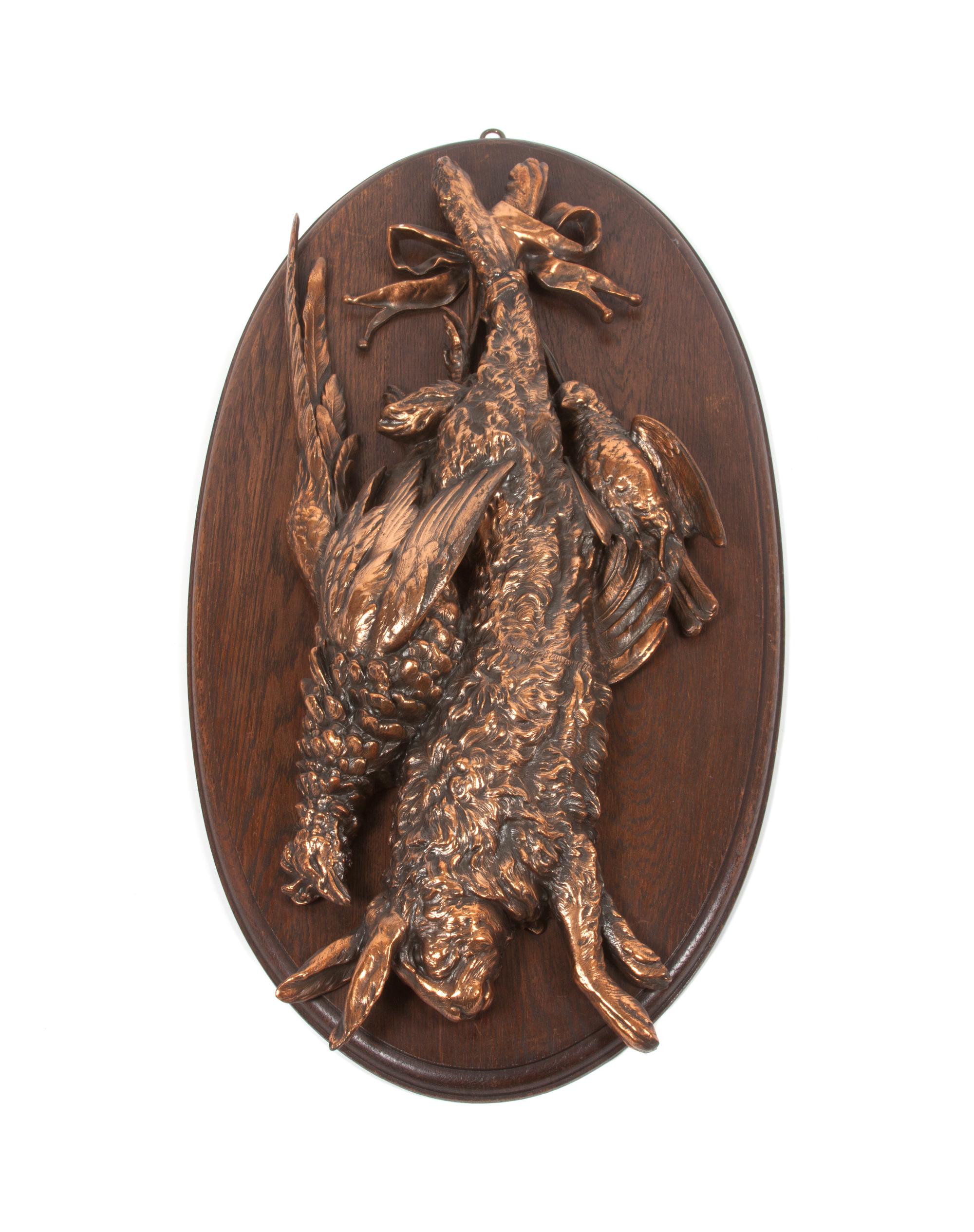 A Pair of Copper or Brass Game Mounts Height overall 31 x width 16 inches.