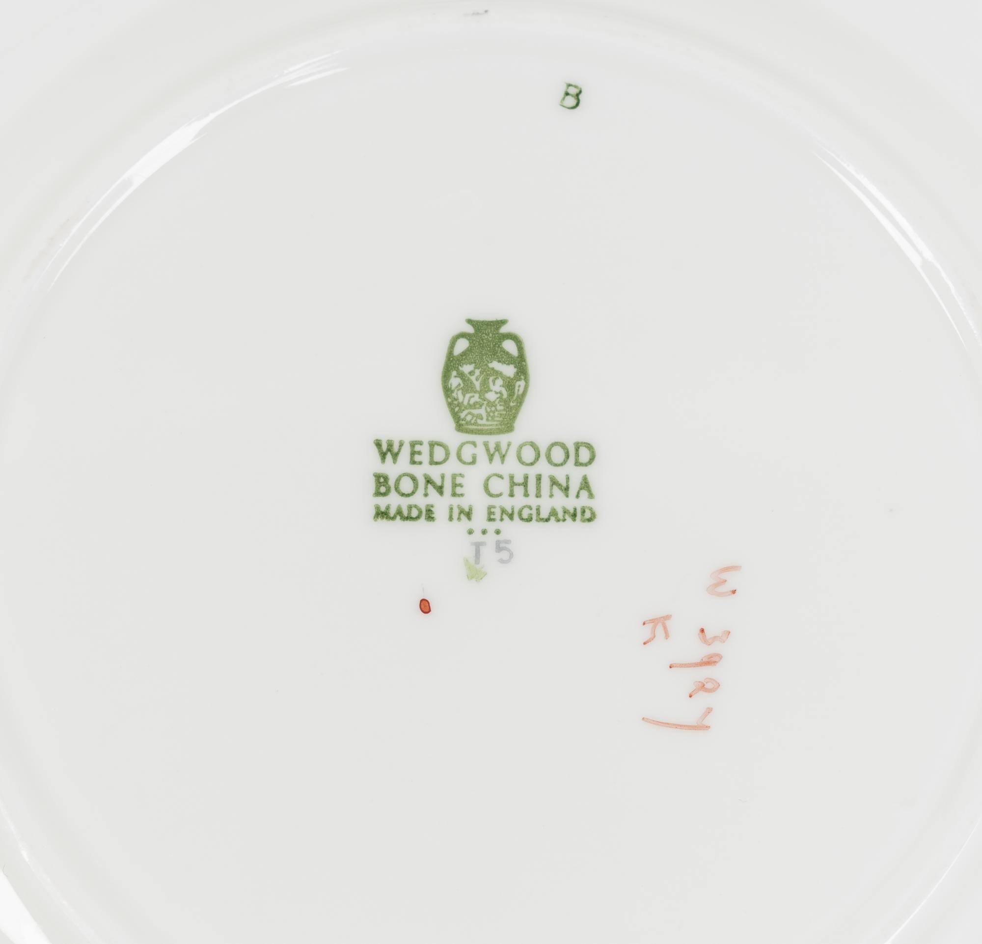 A Set of Twelve Royal Worcester Porcelain Chargers and Eleven Similar Wedgwood Porcelain Salad Plates