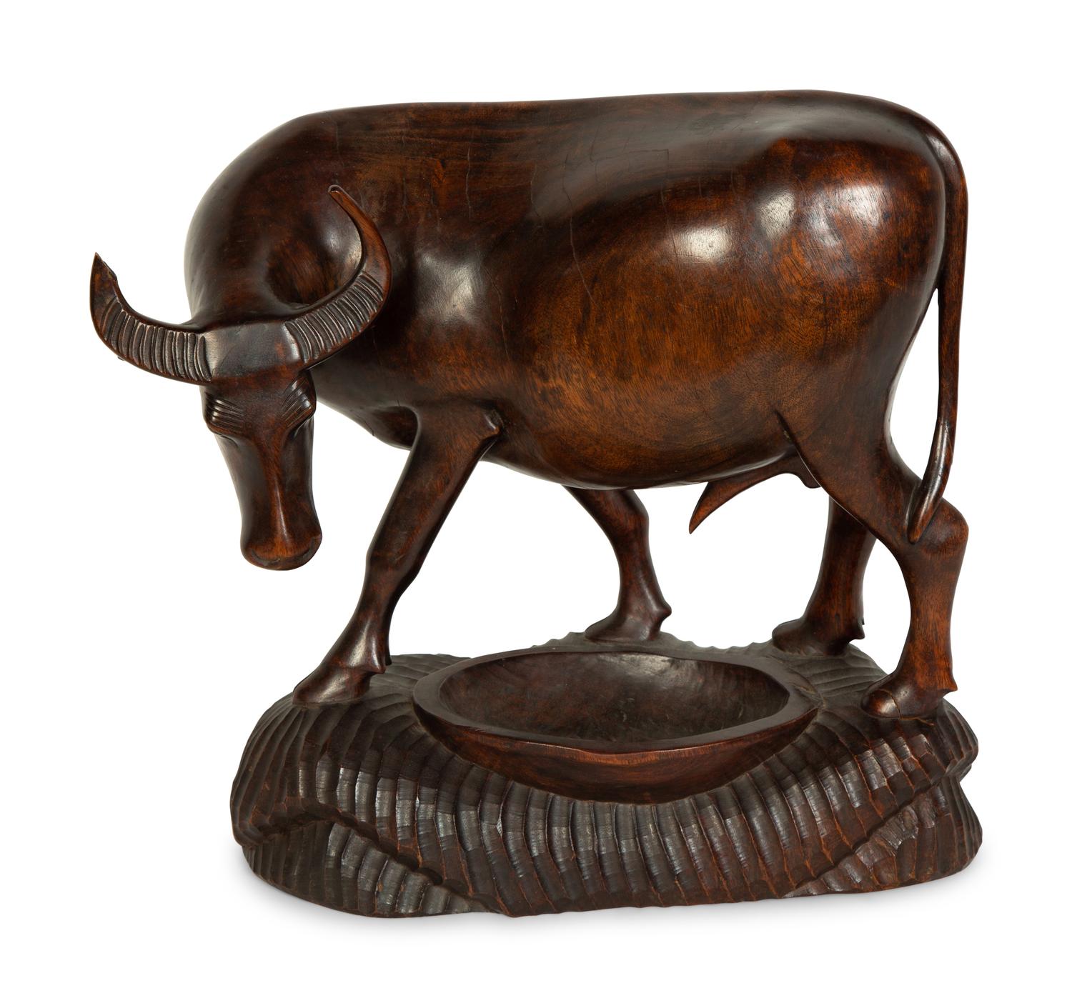 A Carved Wood Bull Sculpture