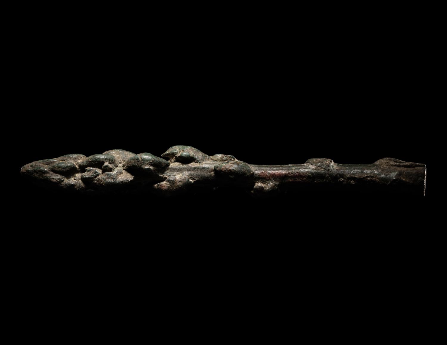 A Roman Bronze Asparagus and a Roman Bronze Hand Pin