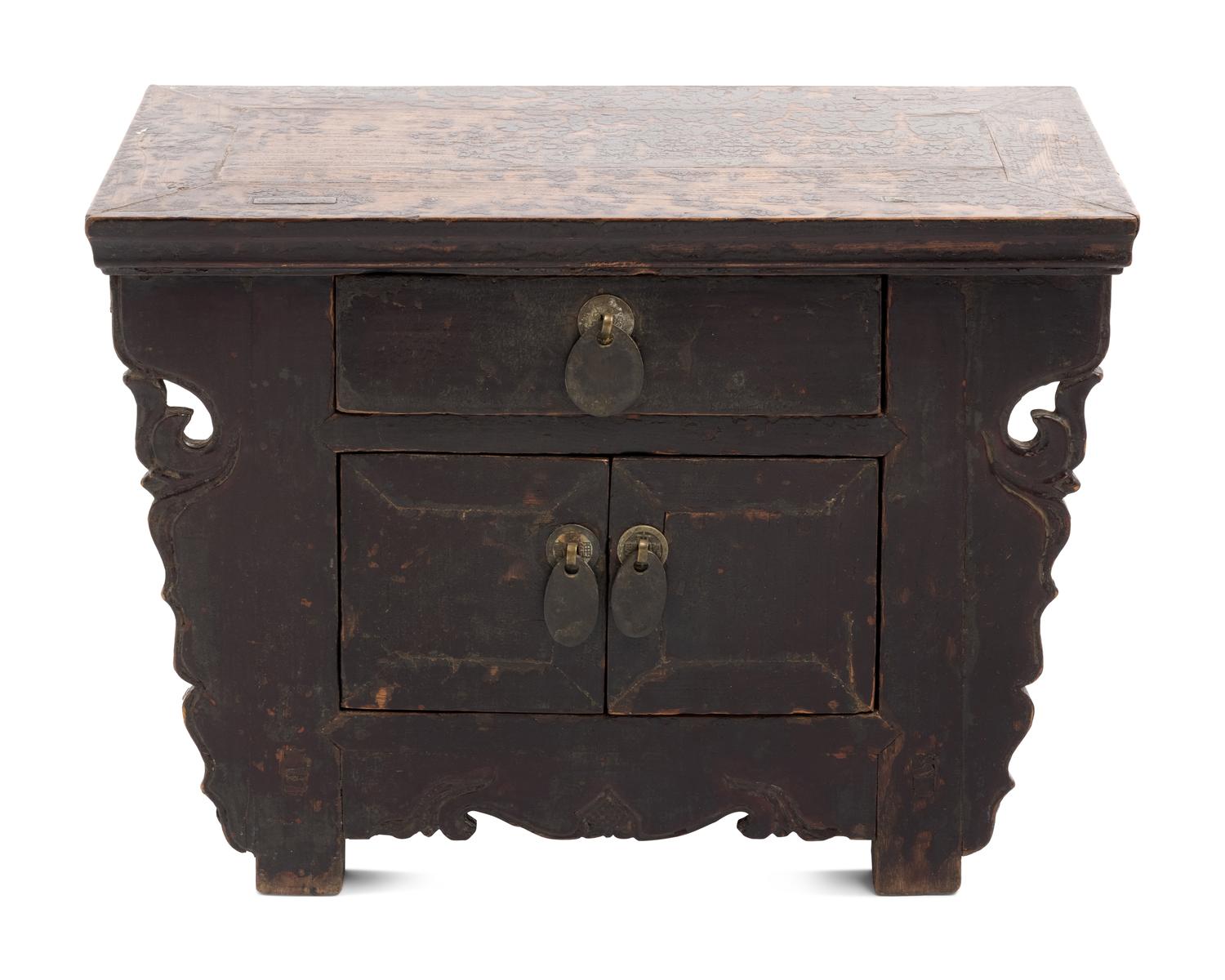 A Chinese Carved and Black Painted Wood Diminutive Chest