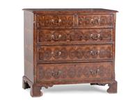 A George III Oysterwood-Veneered Chest of Drawers