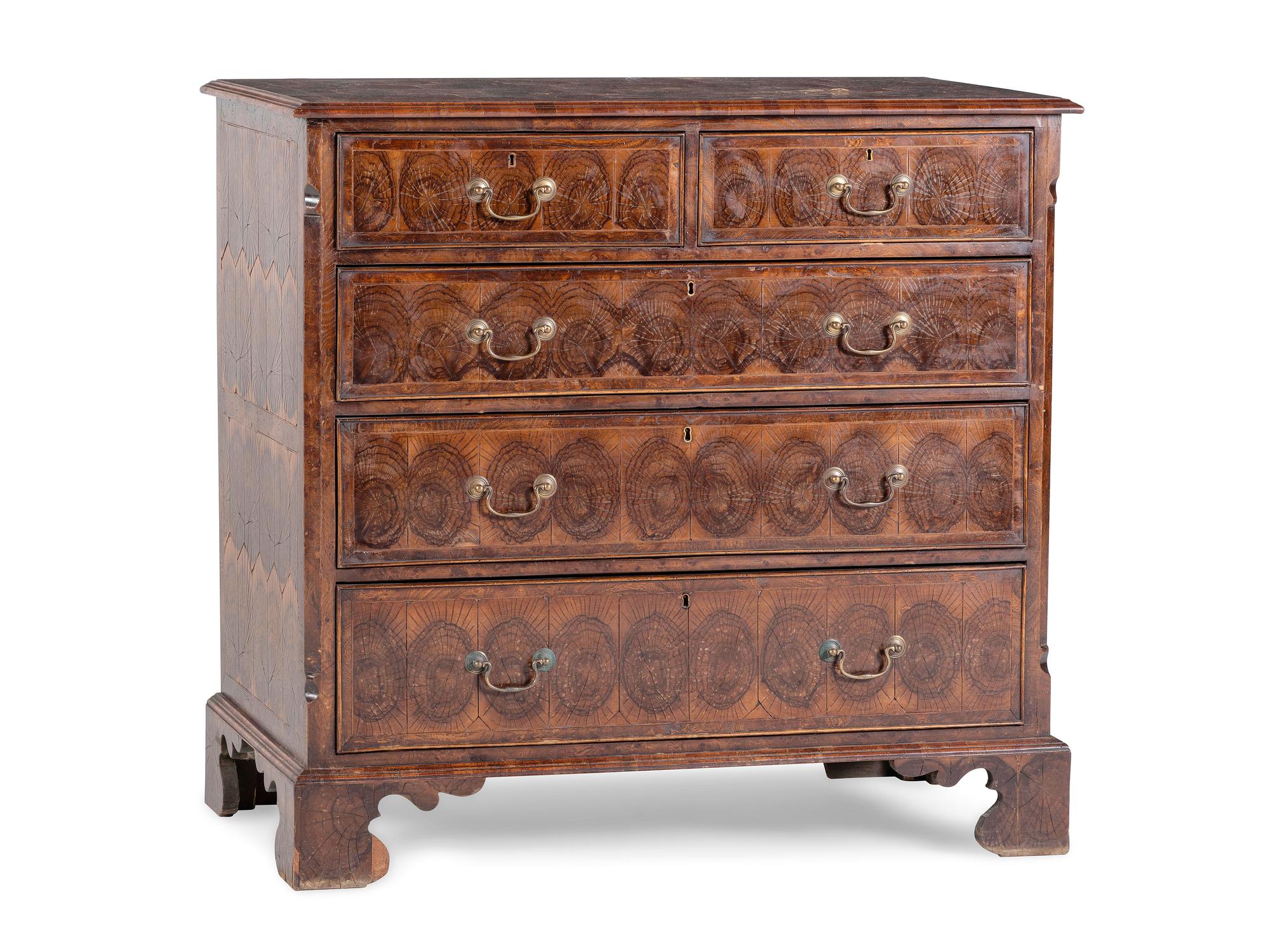 A George III Oysterwood-Veneered Chest of Drawers