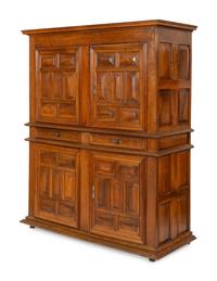 A Large Italian Baroque Carved Walnut Deux Corps Cabinet