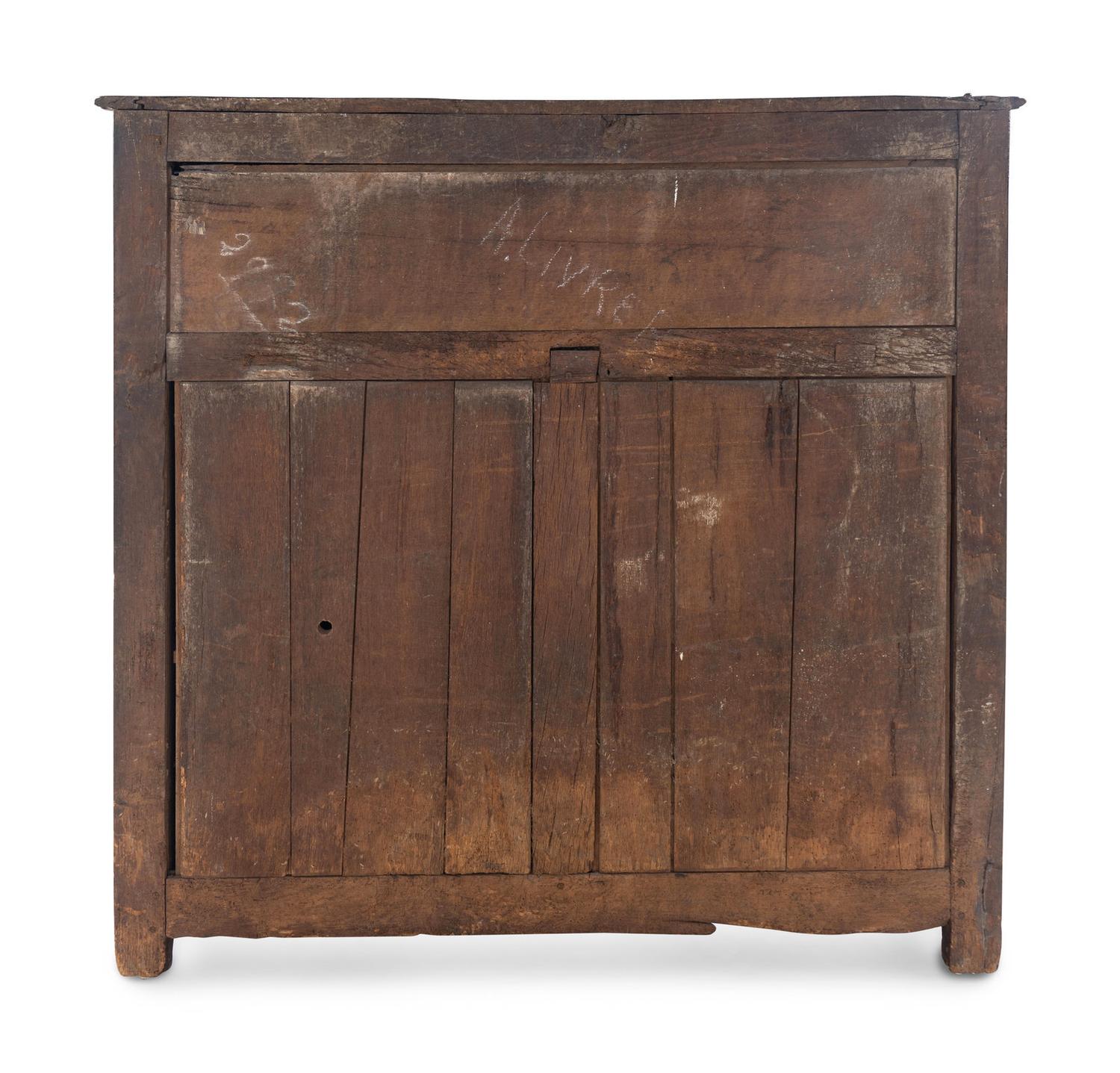 A French Provincial Carved Oak Cabinet