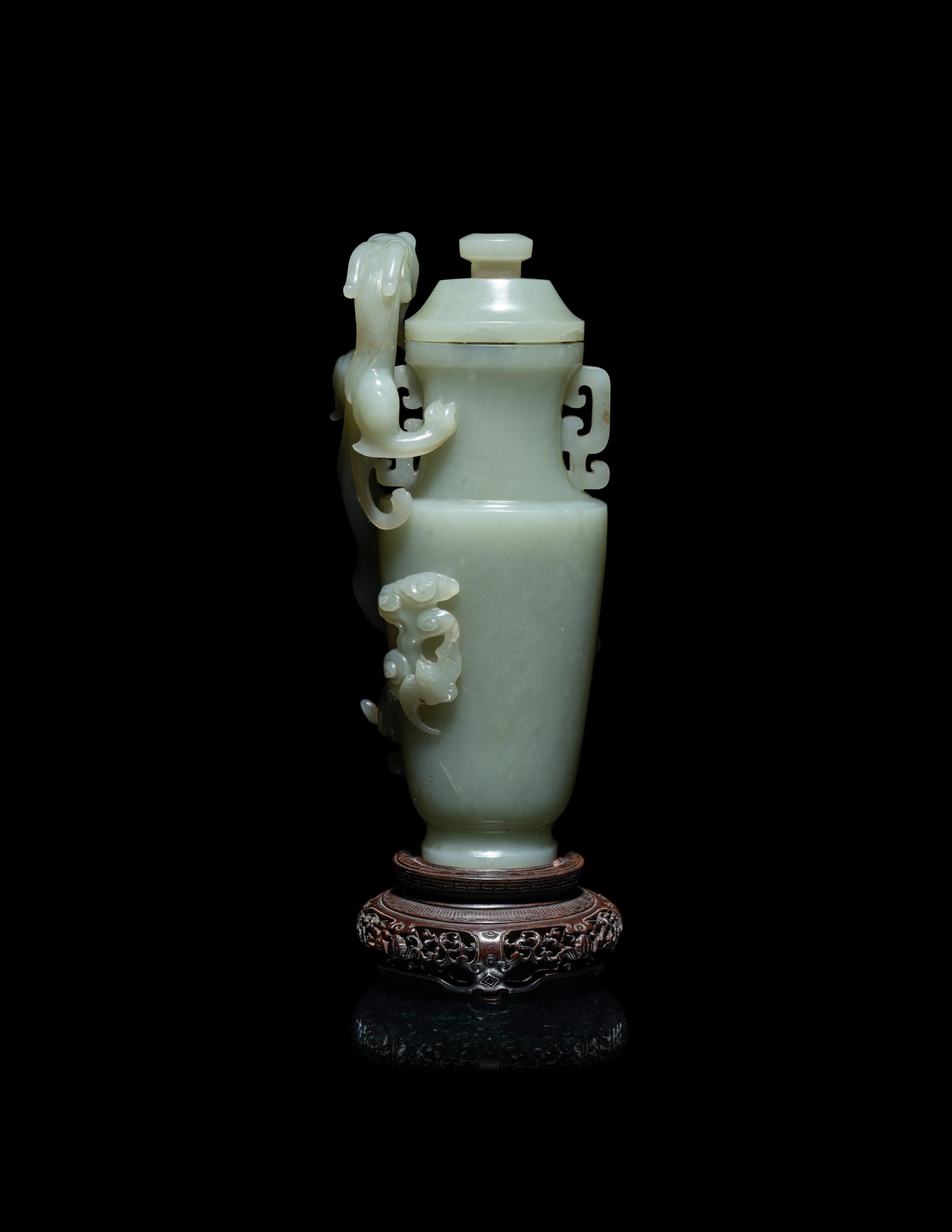 A Finely Carved Chinese Celadon Jade 'Chilong' Covered Vase