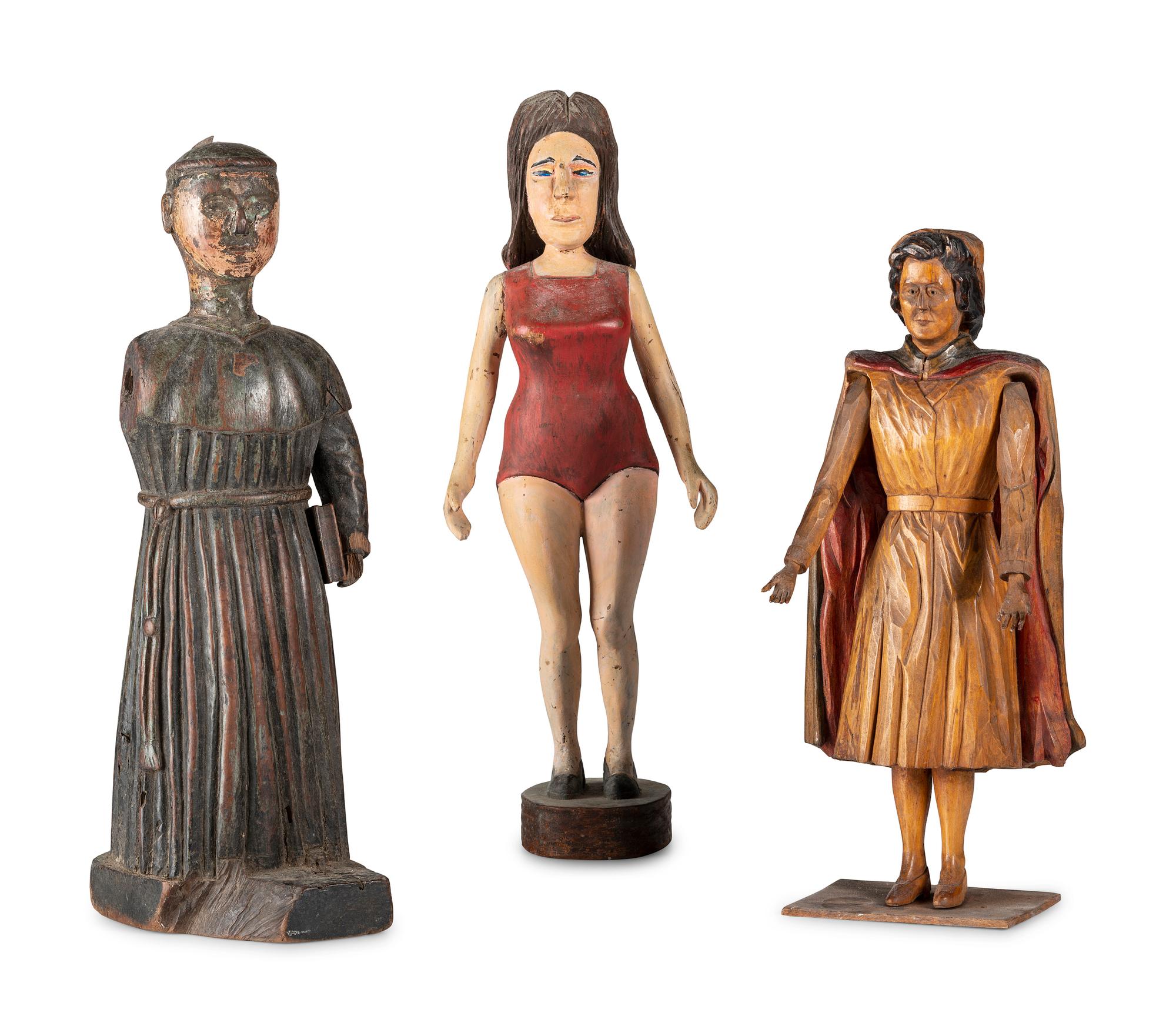 Three Carved and Painted Wooden Figures