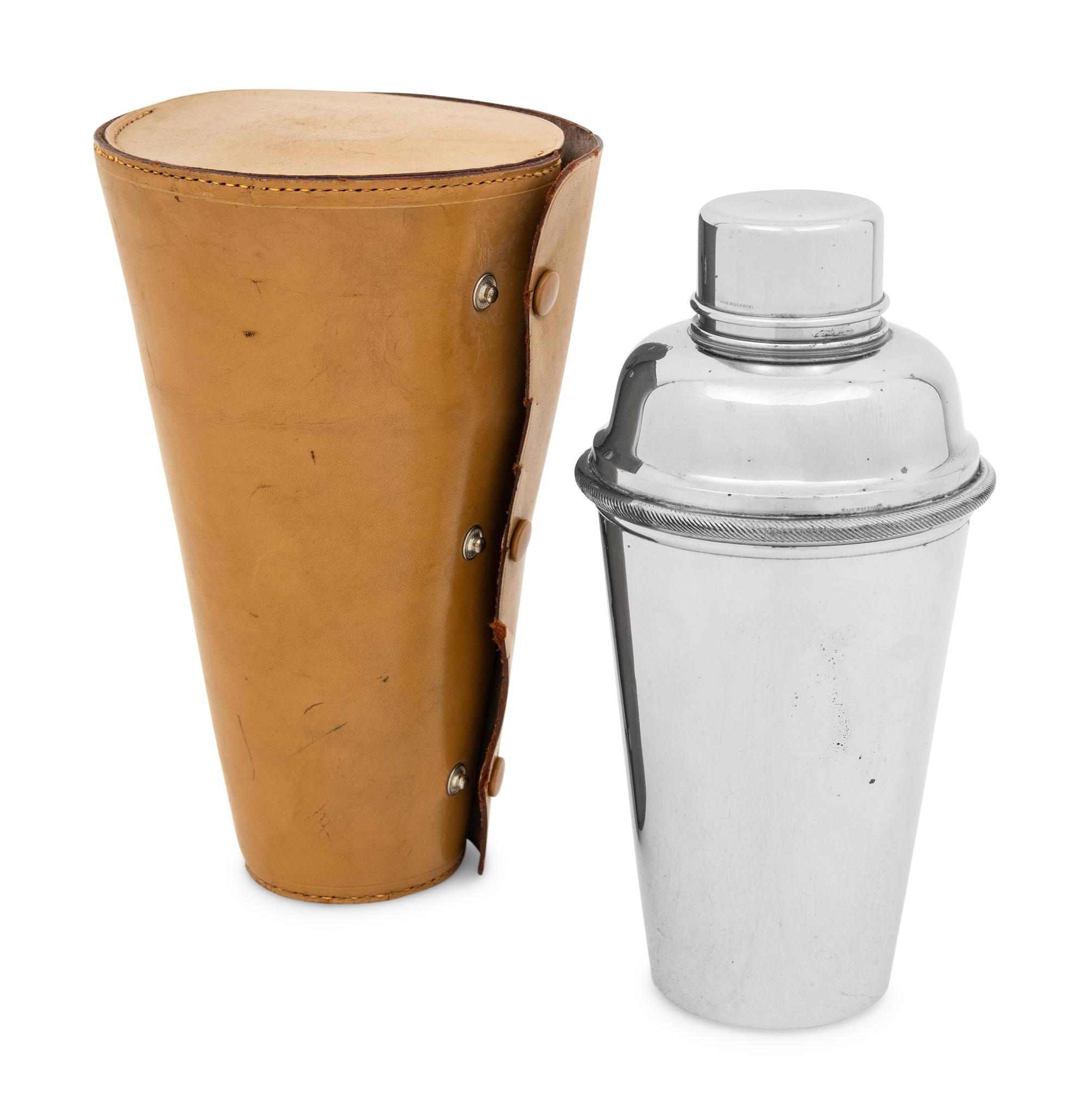 A Group of Three Silver-Plate Cocktail Shakers