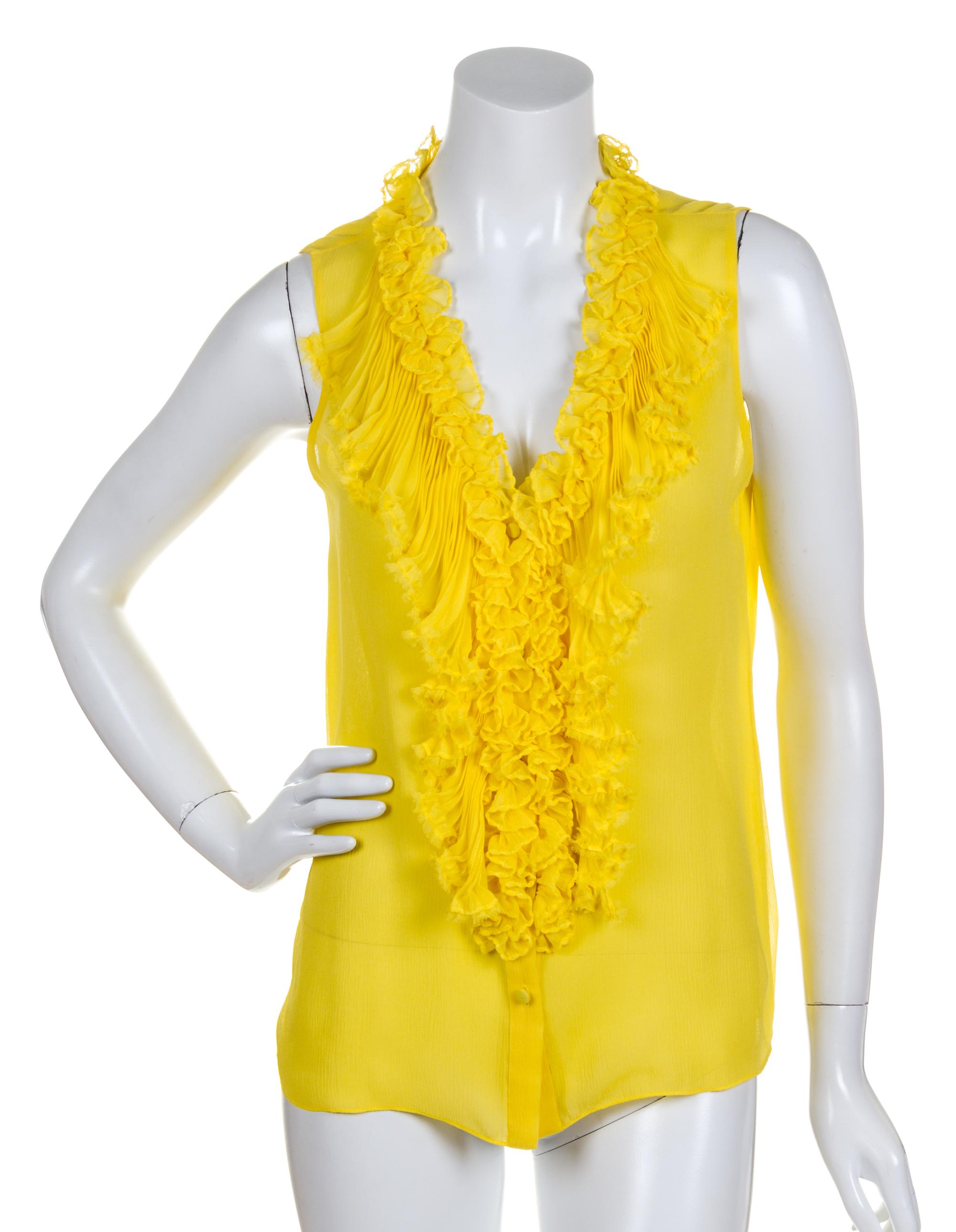 A Pair of Oscar de la Renta Silk Sleeveless Blouses, Size 4 (daffodil) and size 6 (black).
