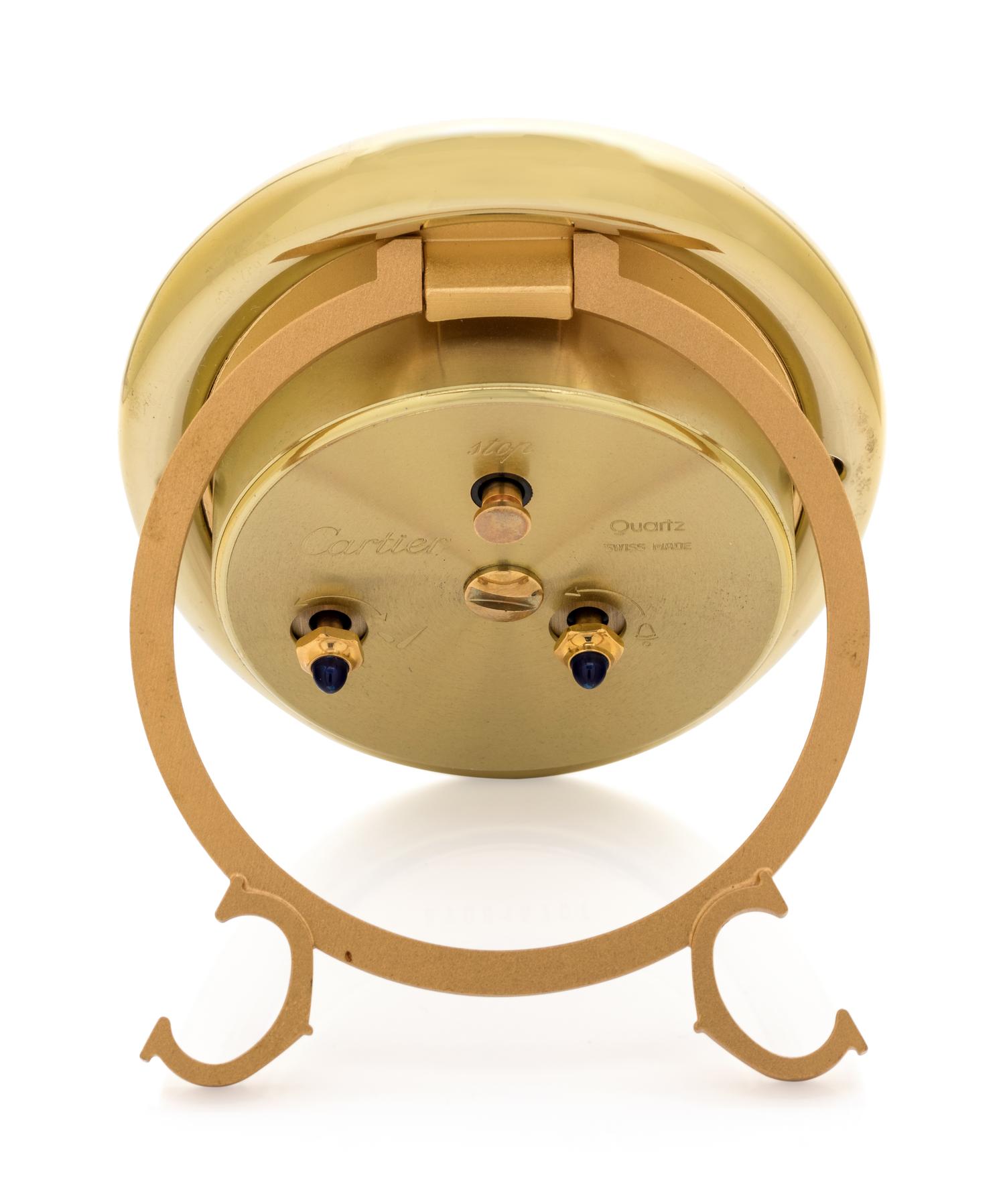 CARTIER, GOLD-PLATED 'BAIGNOIRE' ALARM TABLE CLOCK — 185.00 dwt.