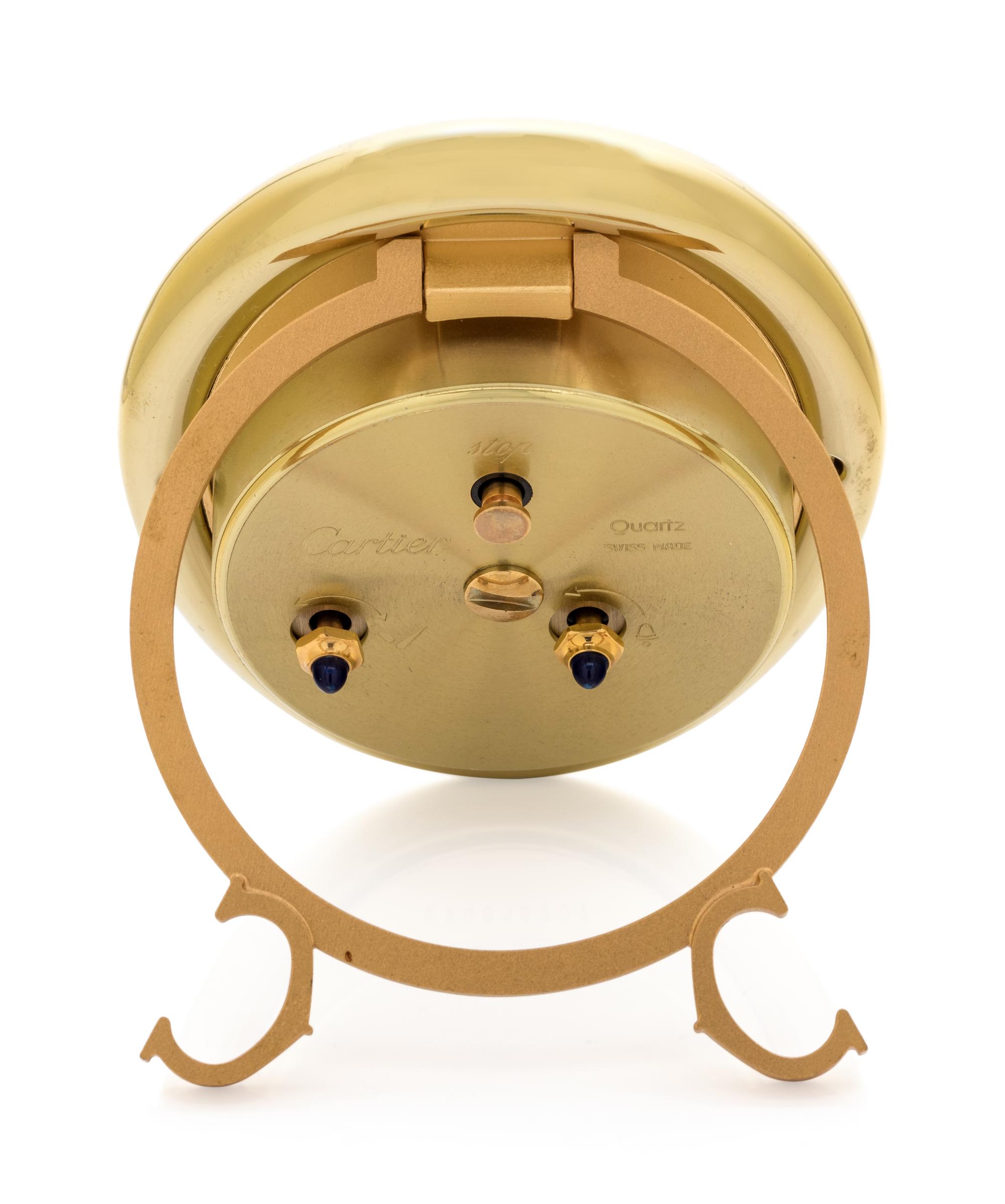 CARTIER, GOLD-PLATED 'BAIGNOIRE' ALARM TABLE CLOCK — 185.00 dwt.
