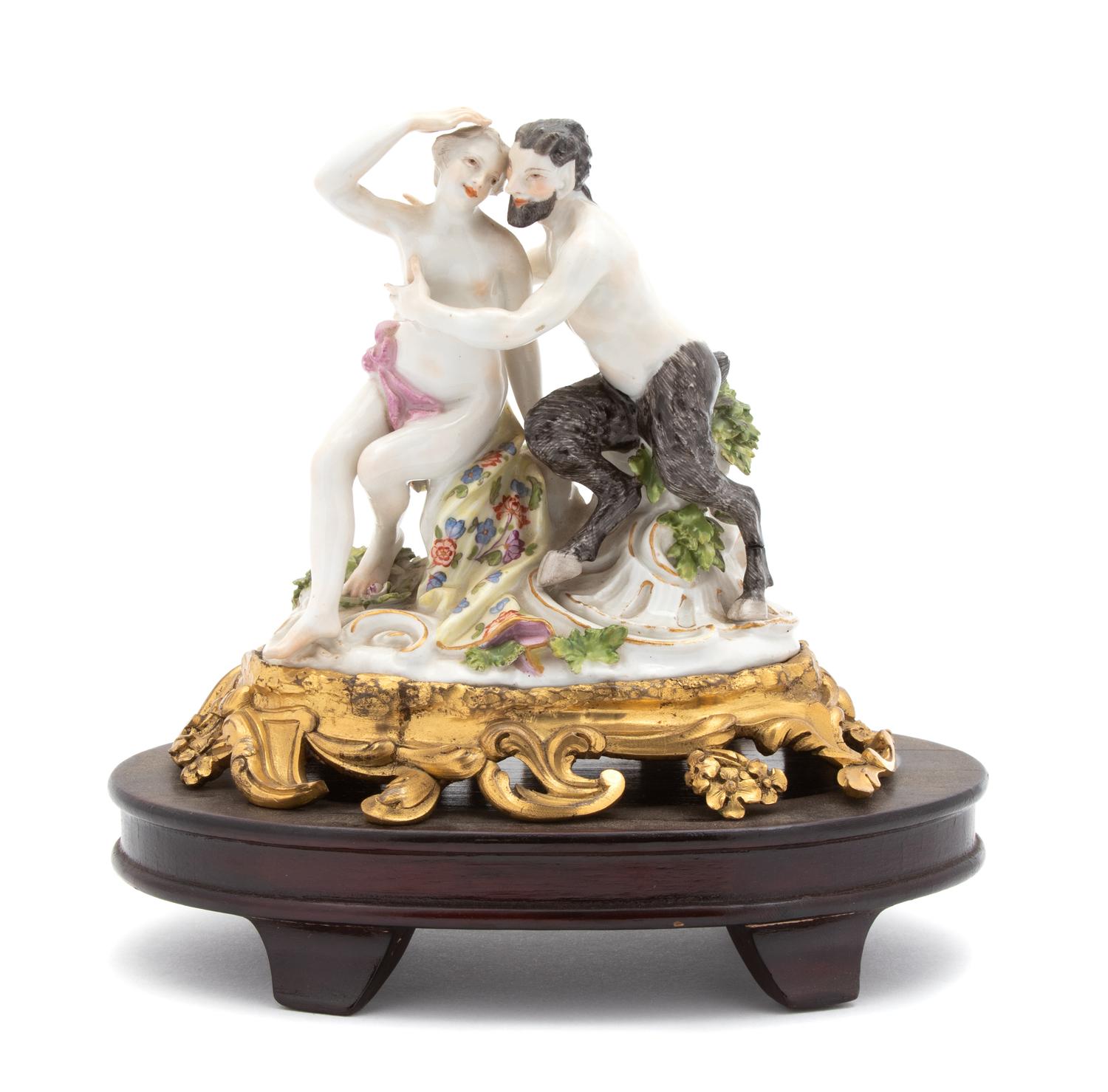 A Meissen Porcelain Group of Satyr and Bacchante Height 5 1/2 inches. — 18TH CENTURY
