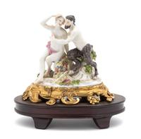 A Meissen Porcelain Group of Satyr and Bacchante Height 5 1/2 inches. — 18TH CENTURY