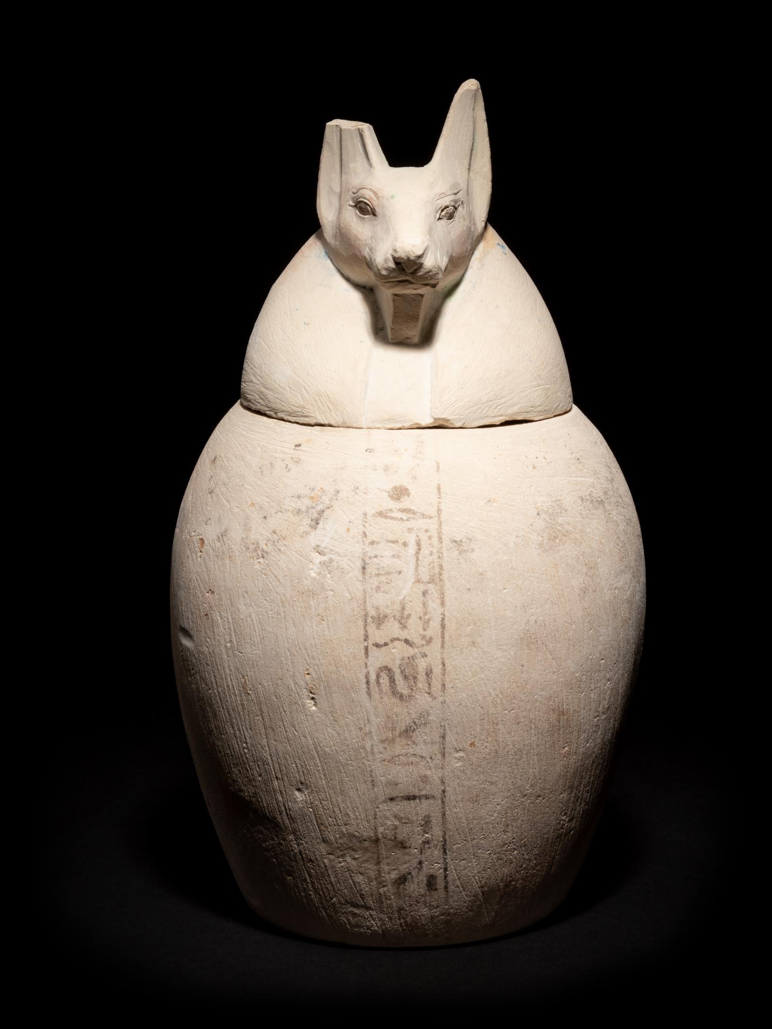 A Set of Four Egyptian Painted Limestone Canopic Jars of the Sons of Horus