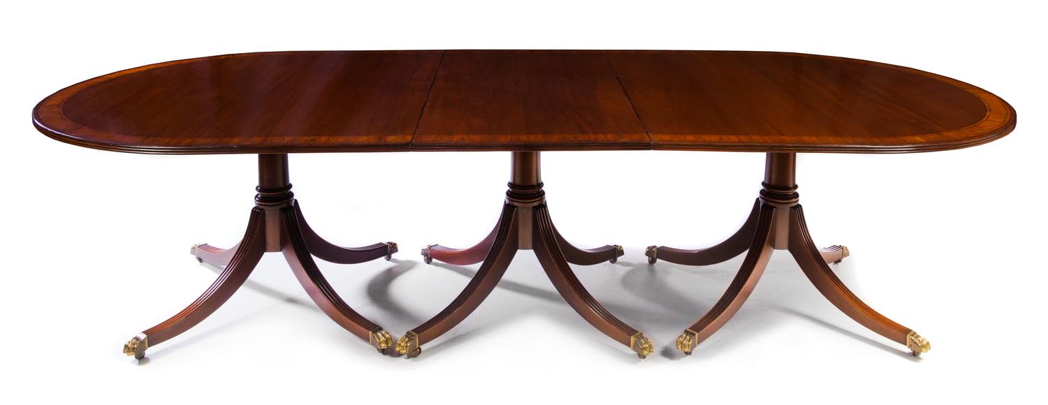 A Regency Style Mahogany Dining Table Height 29 1/2 x width 52 1/2 x length 142 inches (fully extended). — 20TH CENTURY