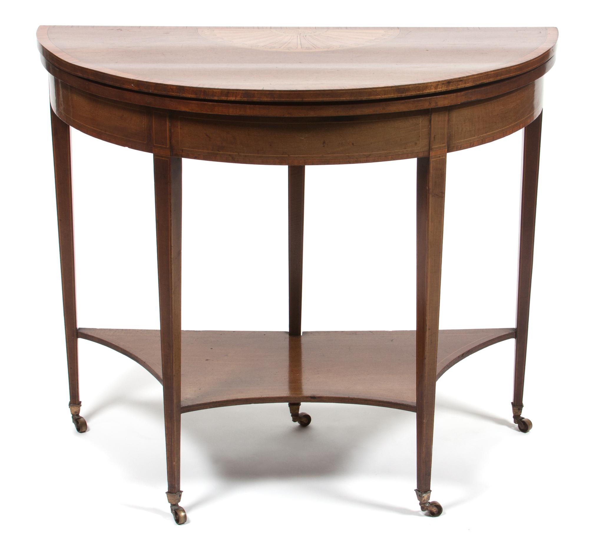 A Georgian Style Inlaid Flip-Top Game Table Height 30 1/2 x width 35 x depth 18 inches (closed). — 19TH/20TH CENTUTY