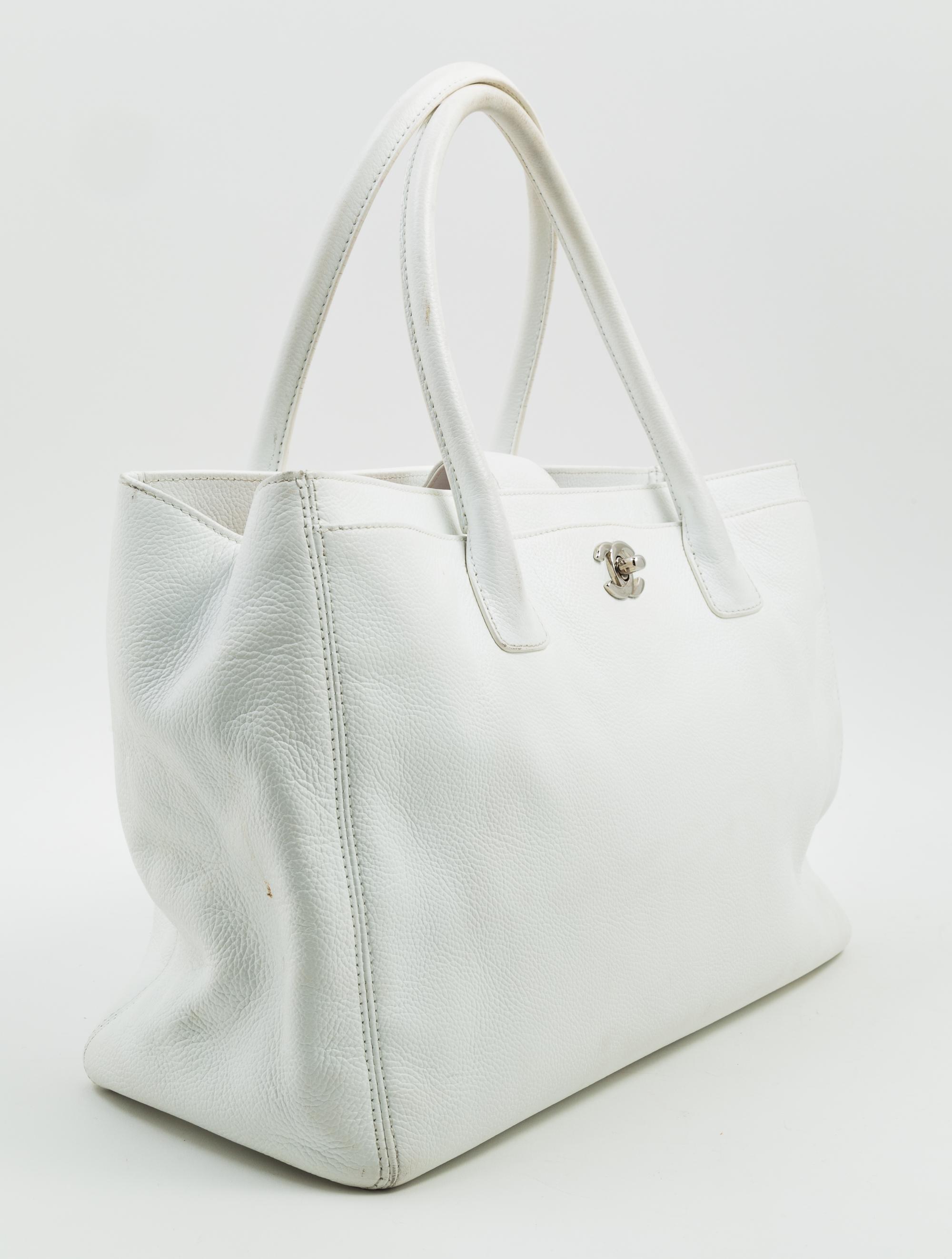 A Chanel White Caviar Tote Bag, 13.3" x 10" x 5.5"; Handle drop: 6.5".