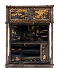 A Japanese Gold, Red, and Brown Lacquer Displaying Cabinet, Kazaridana