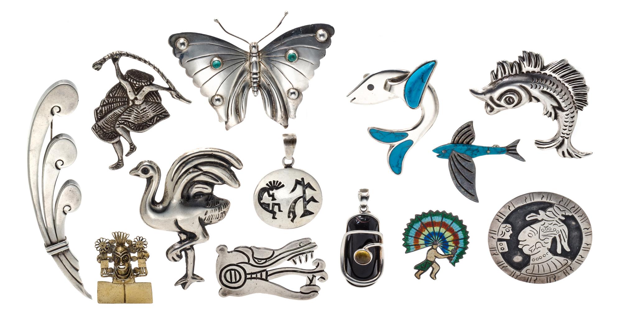A Collection of Silver, Gemstone and Polychrome Brooches and Pendants, 155.30 dwts.