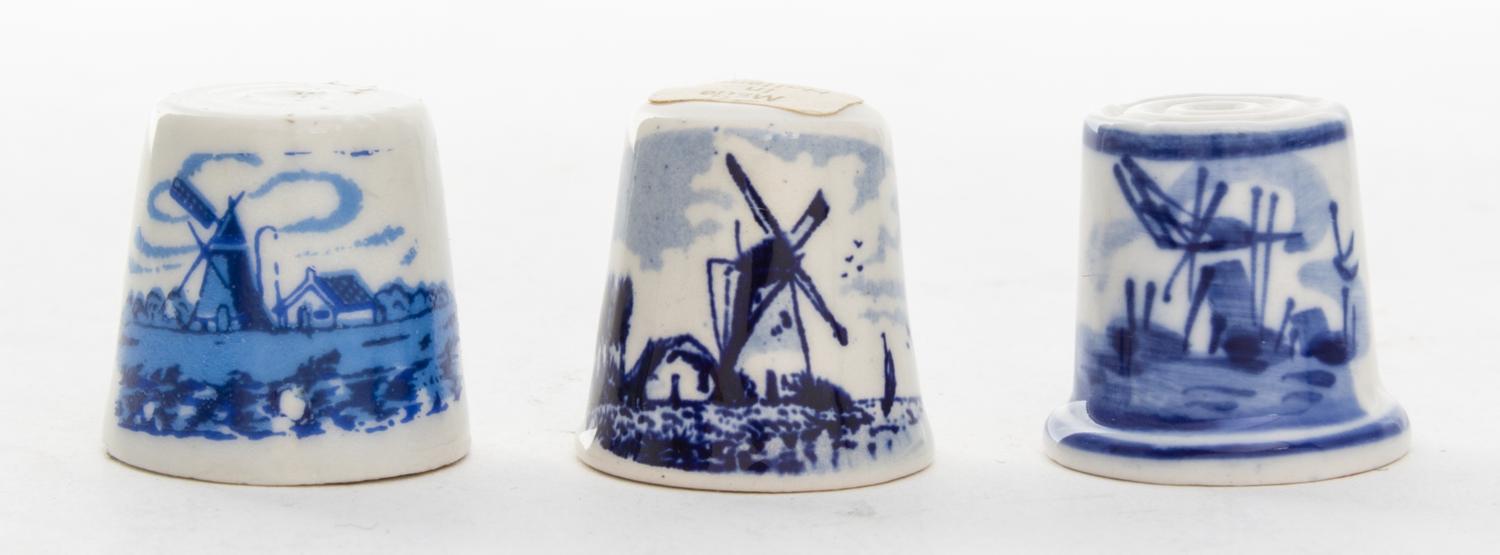 A Collection of Blue and White Porcelain Thimbles Height of tallest 3/4 inches.