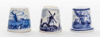 A Collection of Blue and White Porcelain Thimbles Height of tallest 3/4 inches.