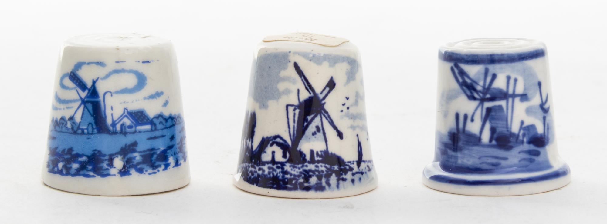 A Collection of Blue and White Porcelain Thimbles Height of tallest 3/4 inches.