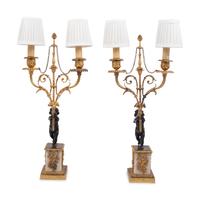 A Pair of French Gilt Metal and Marble Figural Two-Light Candelabra