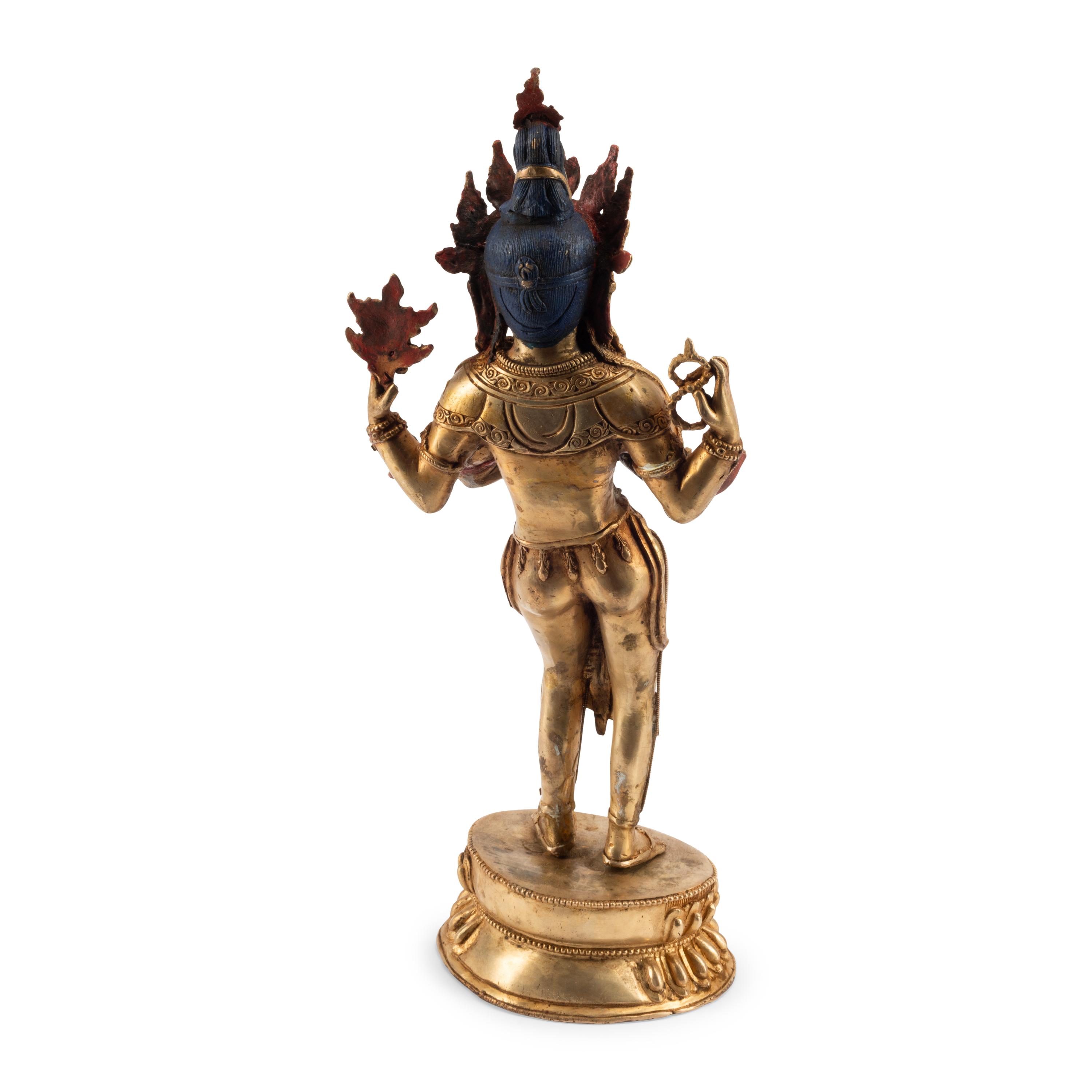A Gilt Bronze, Rock Crystal and Jewel-Inset Figure of a Standing Deity