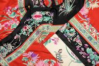 A Red Ground Embroidered Silk Manchu Lady's Robe
