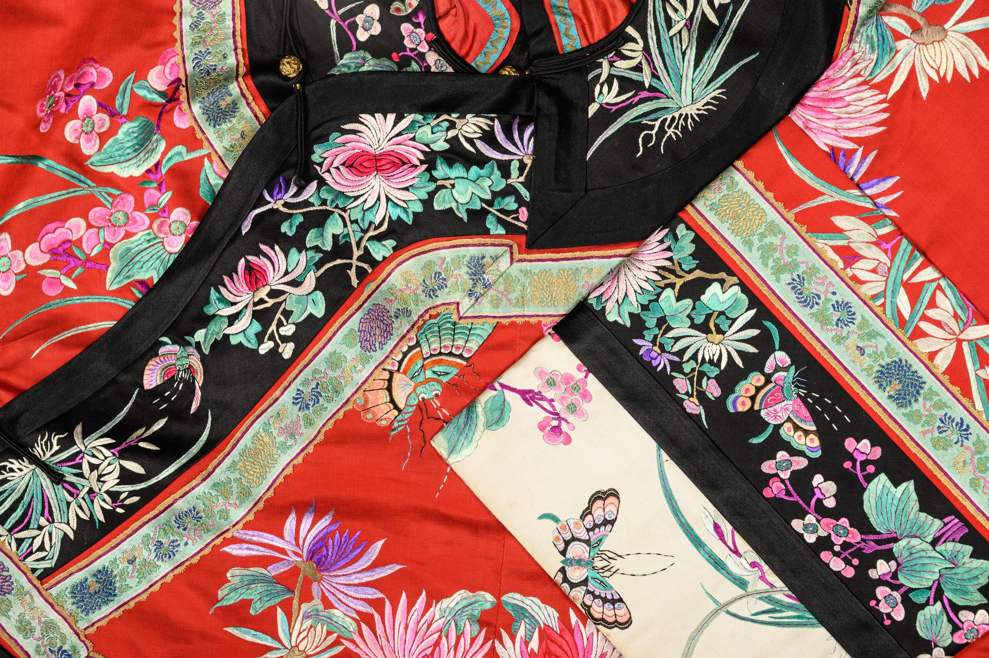 A Red Ground Embroidered Silk Manchu Lady's Robe