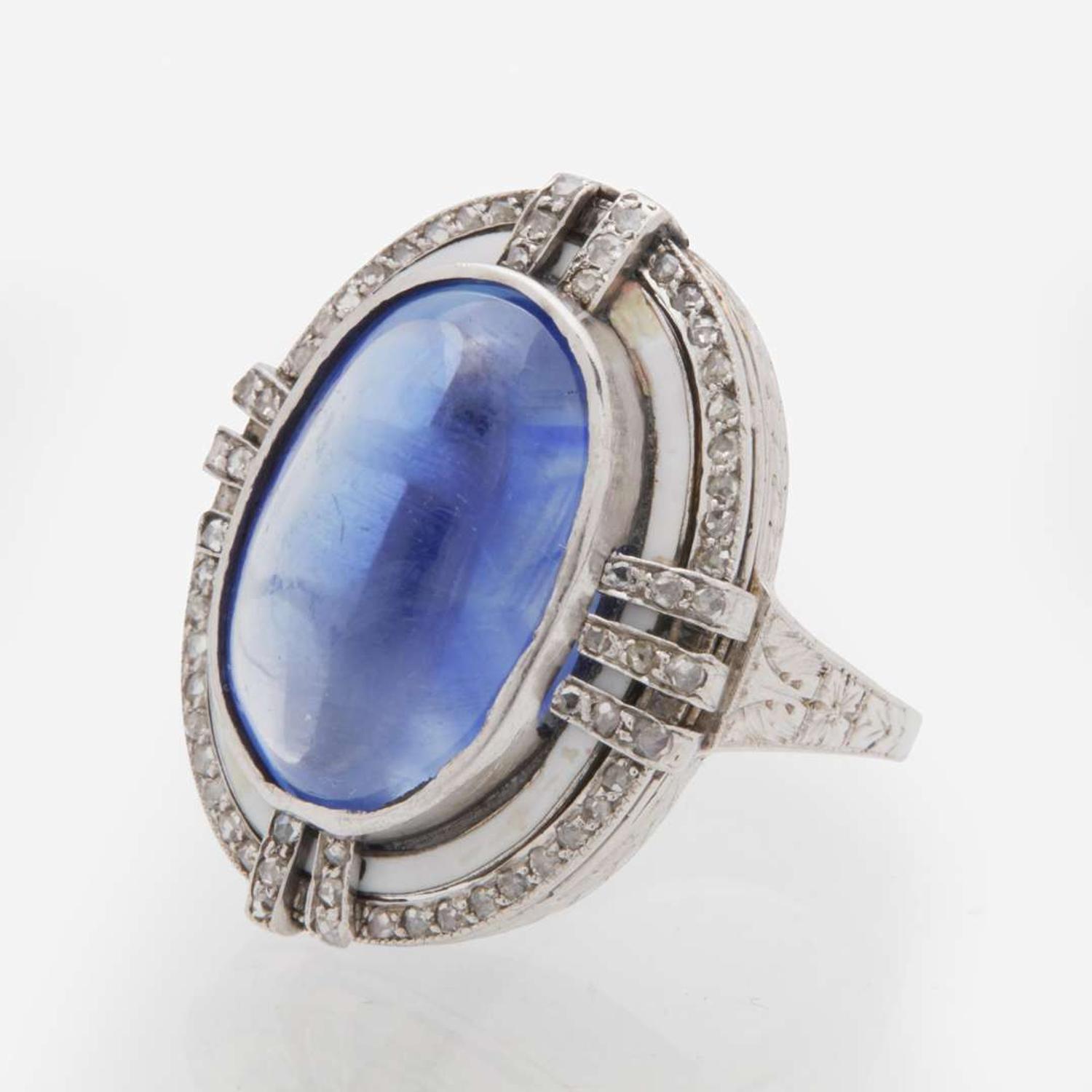 A 14K White Gold, Sugarloaf Sapphire, and Diamond Ring