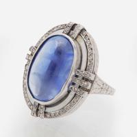 A 14K White Gold, Sugarloaf Sapphire, and Diamond Ring