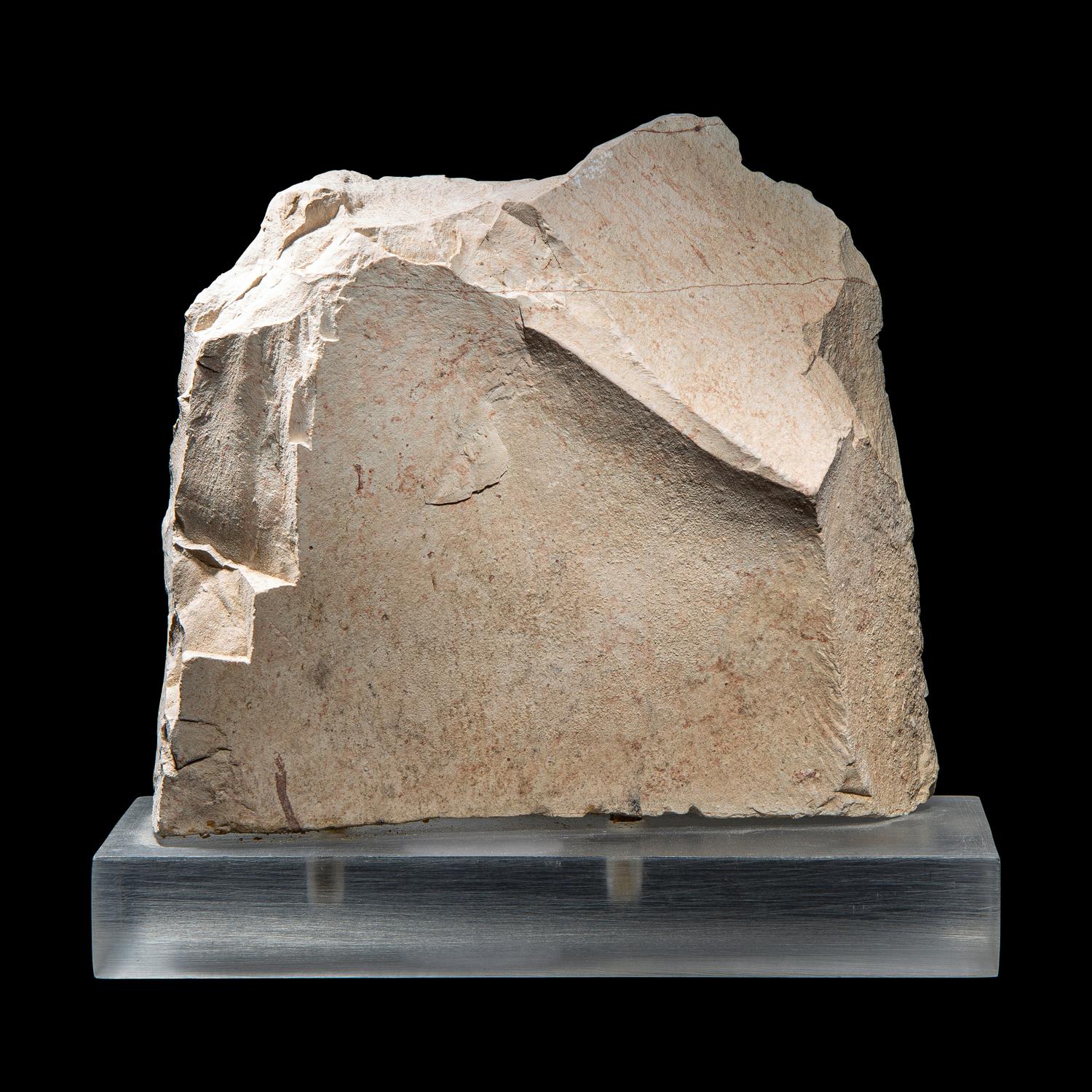 An Egyptian Painted Limestone Relief Fragment