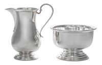 A George V Silver Creamer and Sugar Set, Israel Freeman & Son, Ltd., London, 1935, the creamer of baluster form with a scroll handle, t
