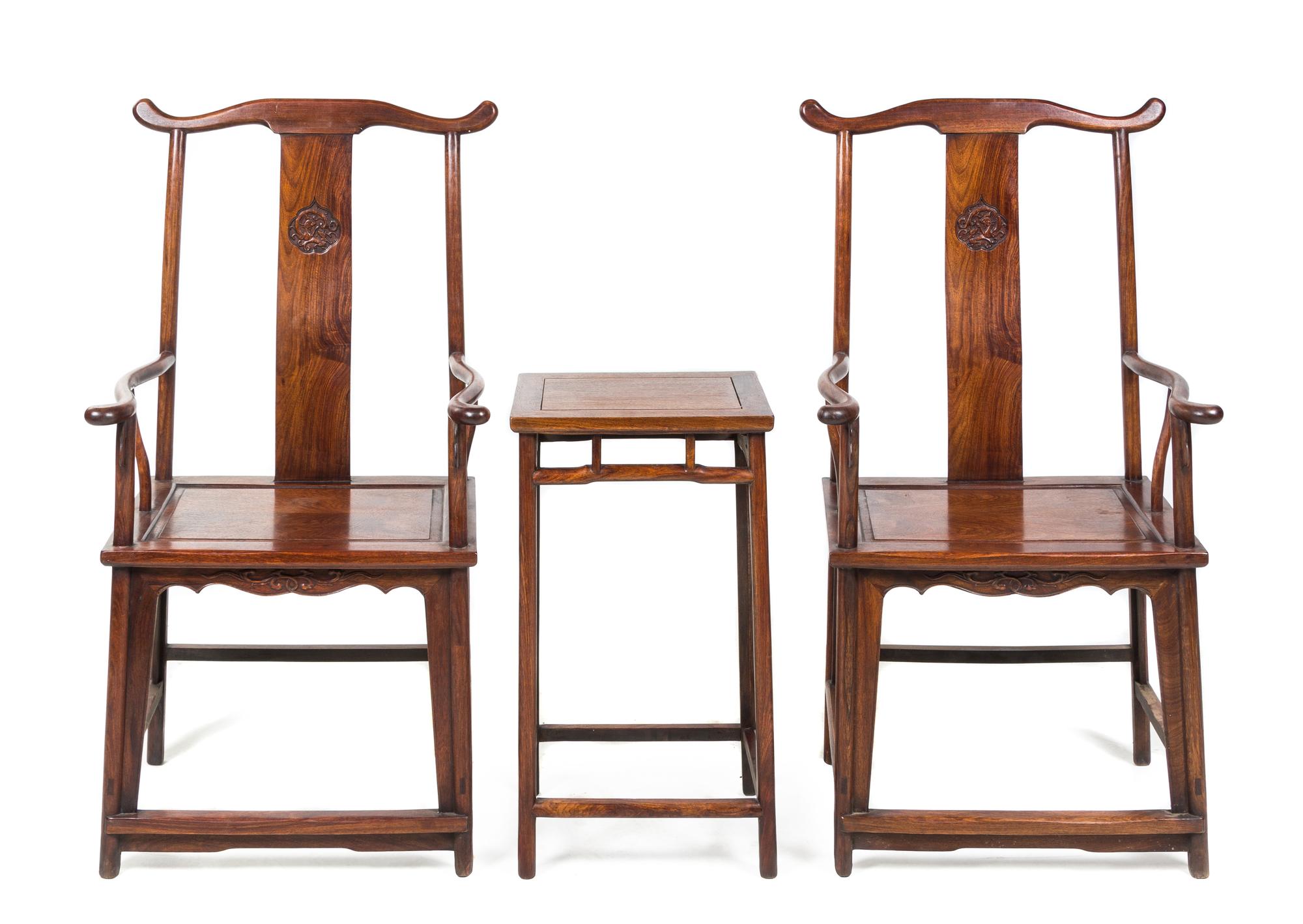 A Pair of Chinese Huali Wood Chairs and a Side Stand Height of each chair 46 1/2 inches.
