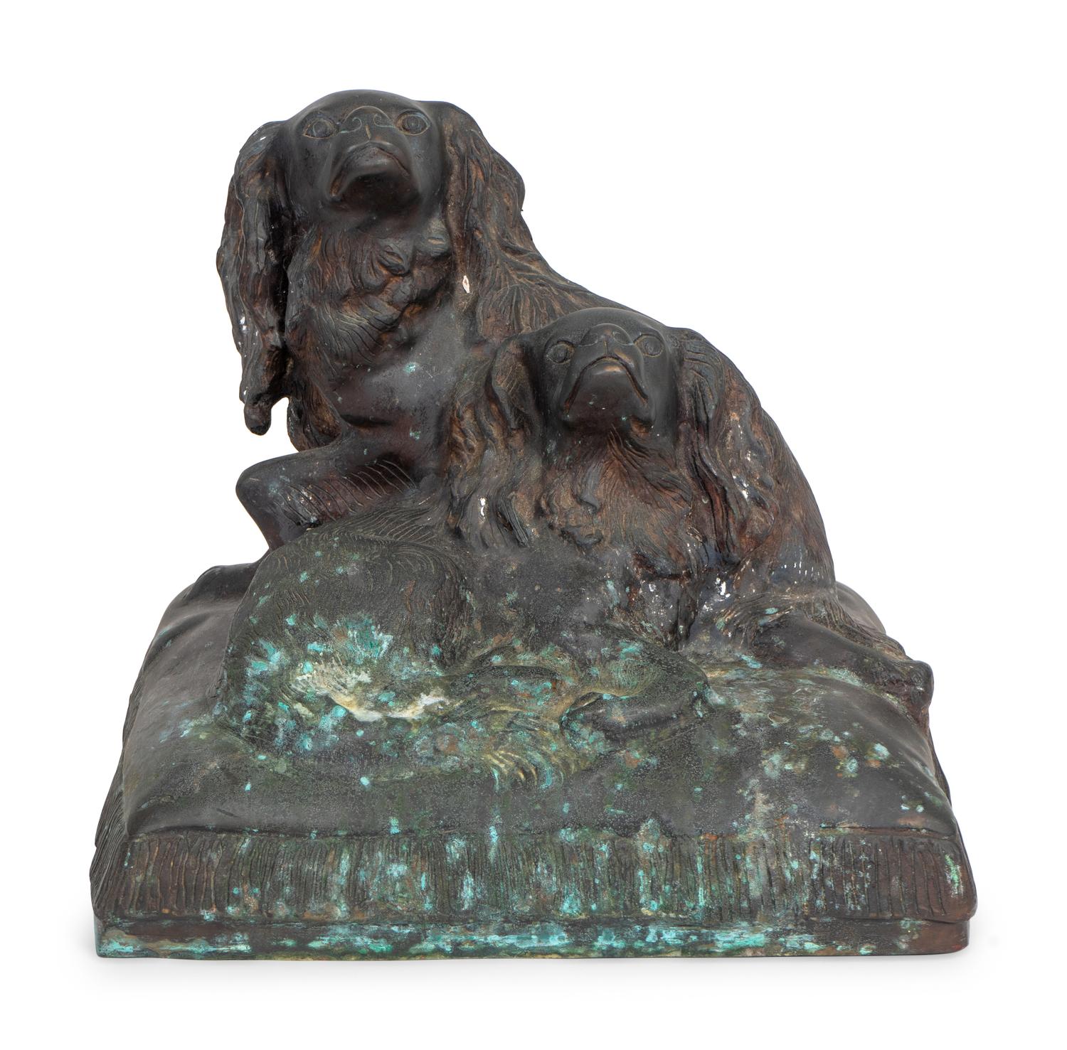 King Charles Spaniels on a Cushion