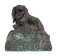 King Charles Spaniels on a Cushion