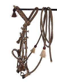 A Group of Western Horse Bridles and Quirts