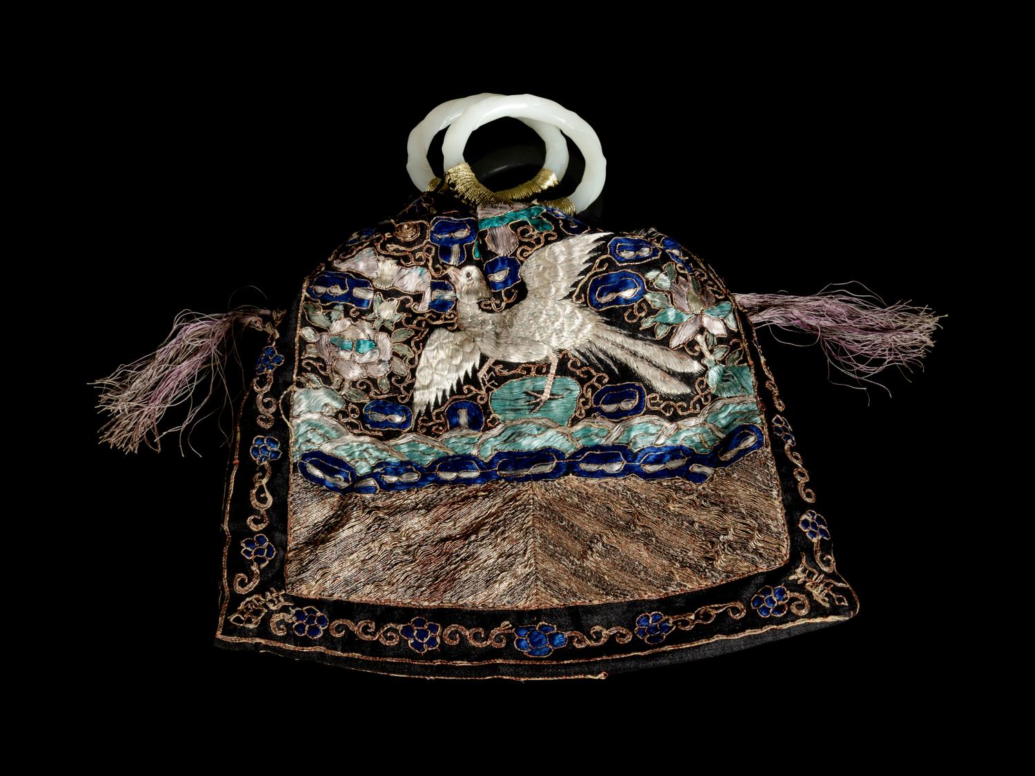 A Chinese Embroidered Silk Purse with a Pair of Jade Bangles