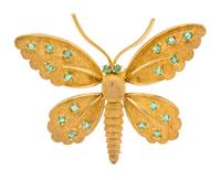 An 18 Karat Yellow Gold and Emerald Articulated Butterfly Brooch, Fred Paris, 9.40 dwts.