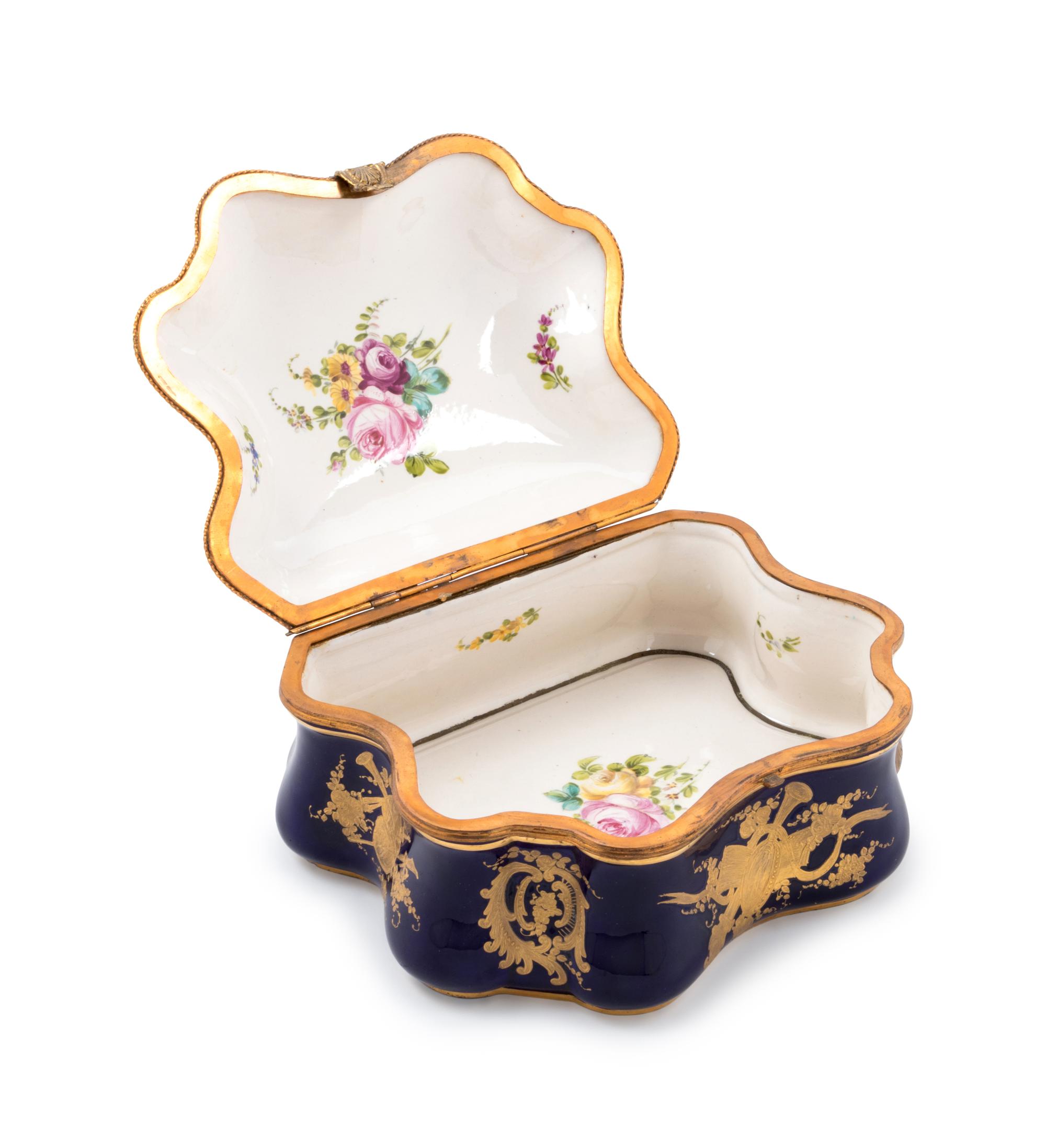 A Sèvres Style Painted and Parcel Gilt Porcelain Table Casket