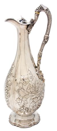 A Victorian Silver Wine Ewer, Henry Wilkinson & Co., Sheffield, 1865, having a foliate scroll handle surmounting a foliate decorated bo